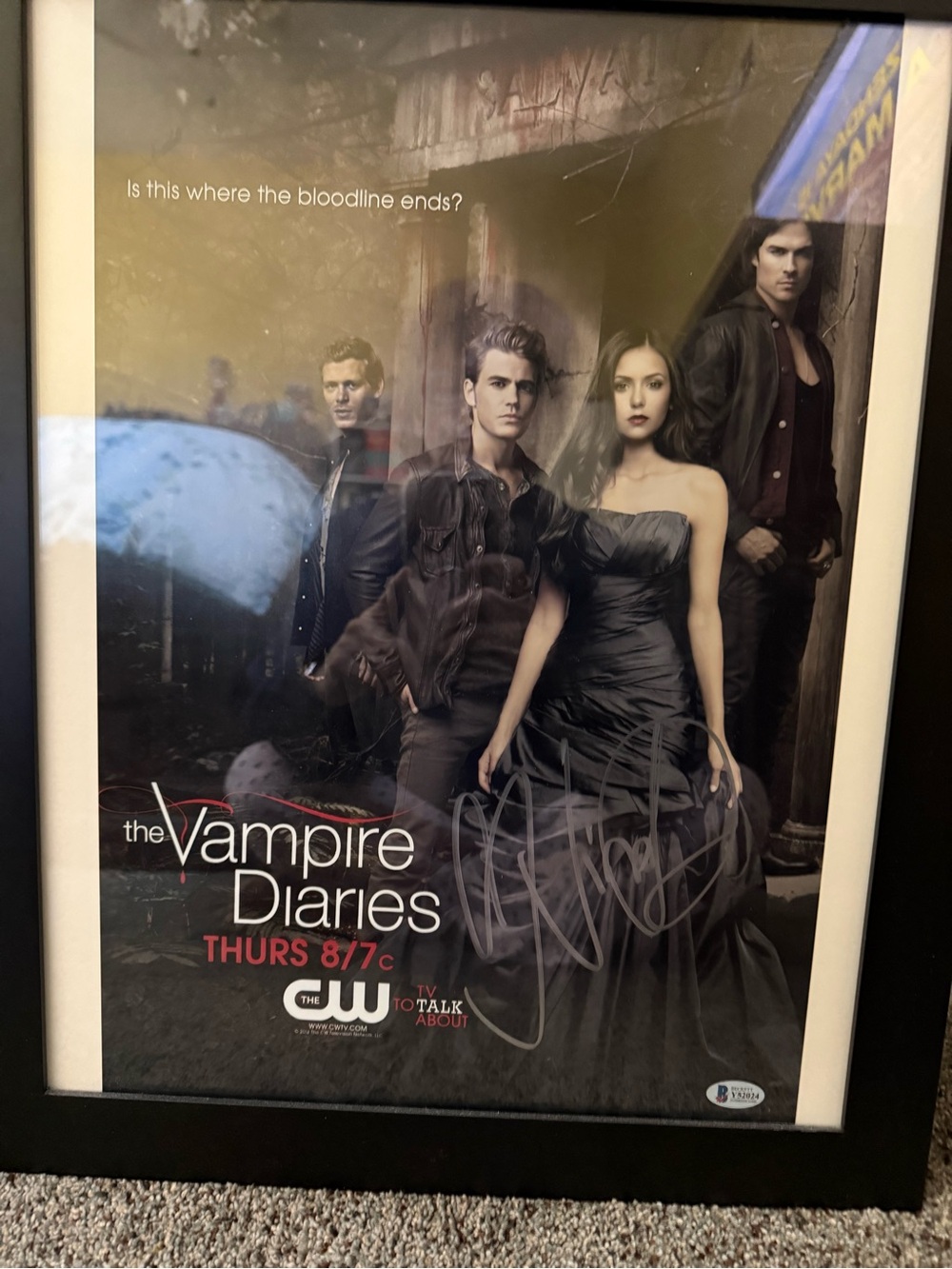 The vampire diaries poster signed by Nina dobrev
